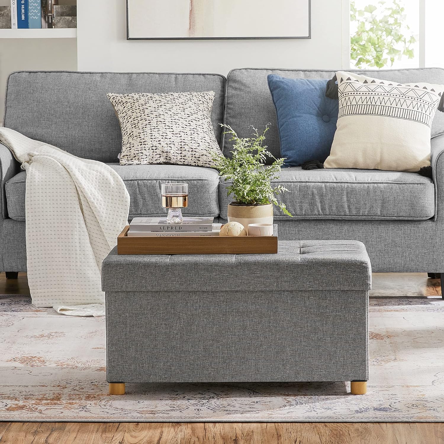 SONGMICS Taburet pliabil cu sezut moale, spatiu de depozitare, maxim 300 kg, 76x38x40 cm, gri deschis