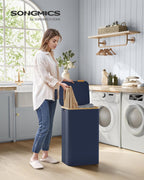 SONGMICS Cos de rufe textil, pliabil, compartiment detasabil, 90L, 42x32x71 cm, albastru