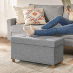 SONGMICS Taburet pliabil cu sezut moale, spatiu de depozitare, maxim 300 kg, 76x38x40 cm, gri deschis