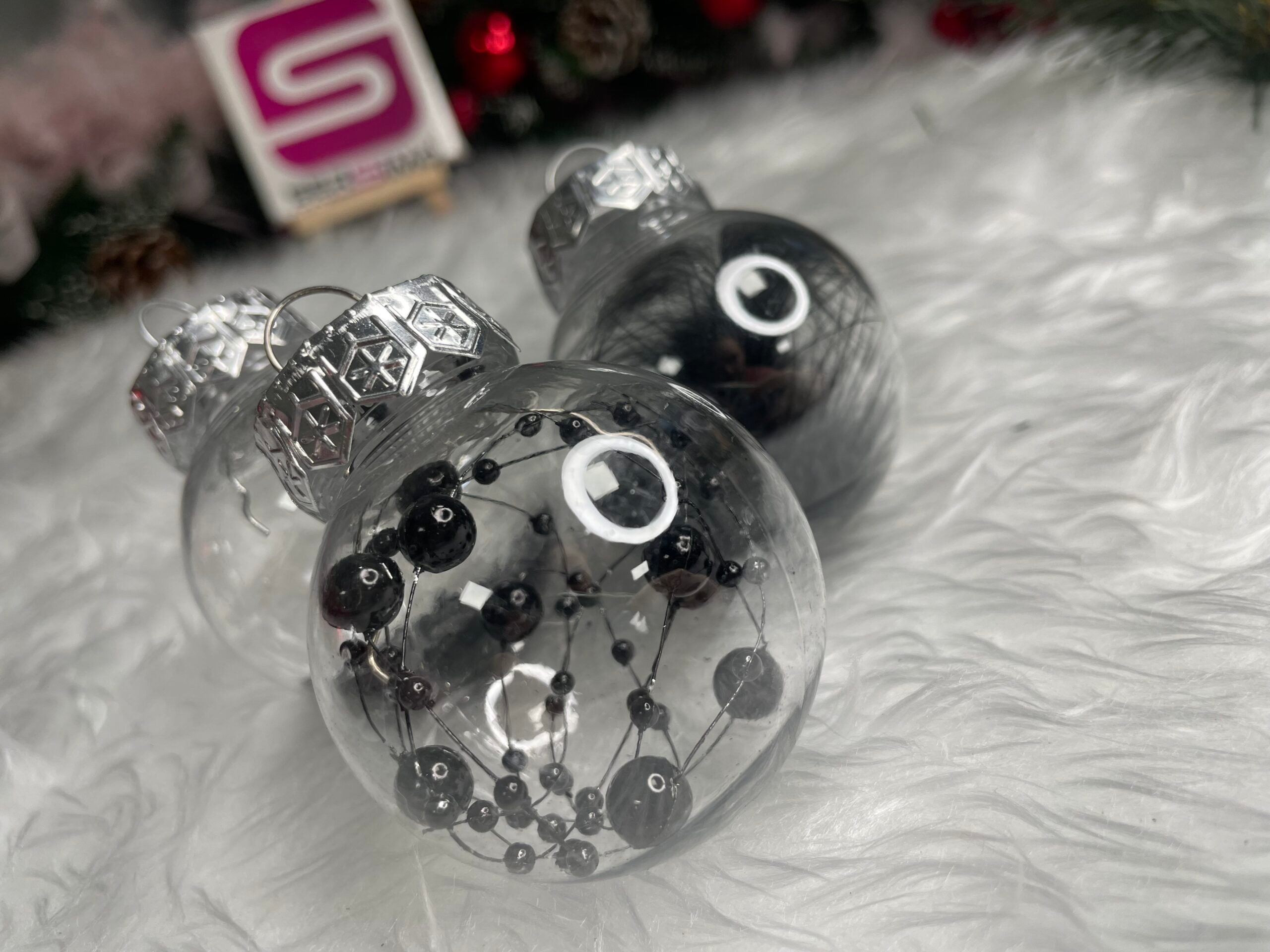 Set globuri de Craciun Inedit, 24 bucati, 5cm, transparente cu interior negru